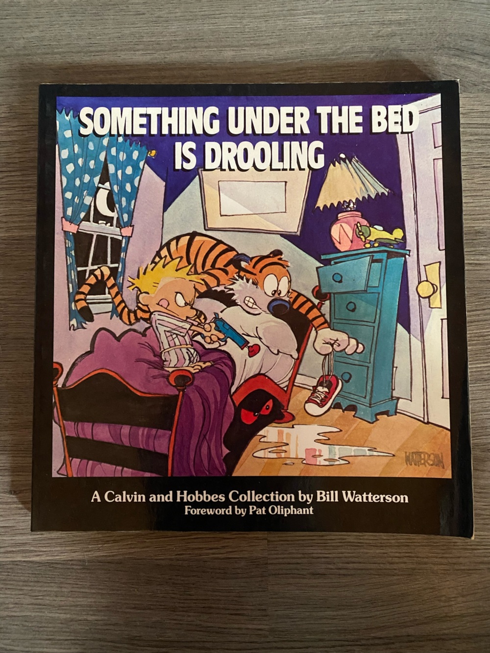 Calvin and Hobbes: Something Under the Bed Is Drooling - Purple Cover